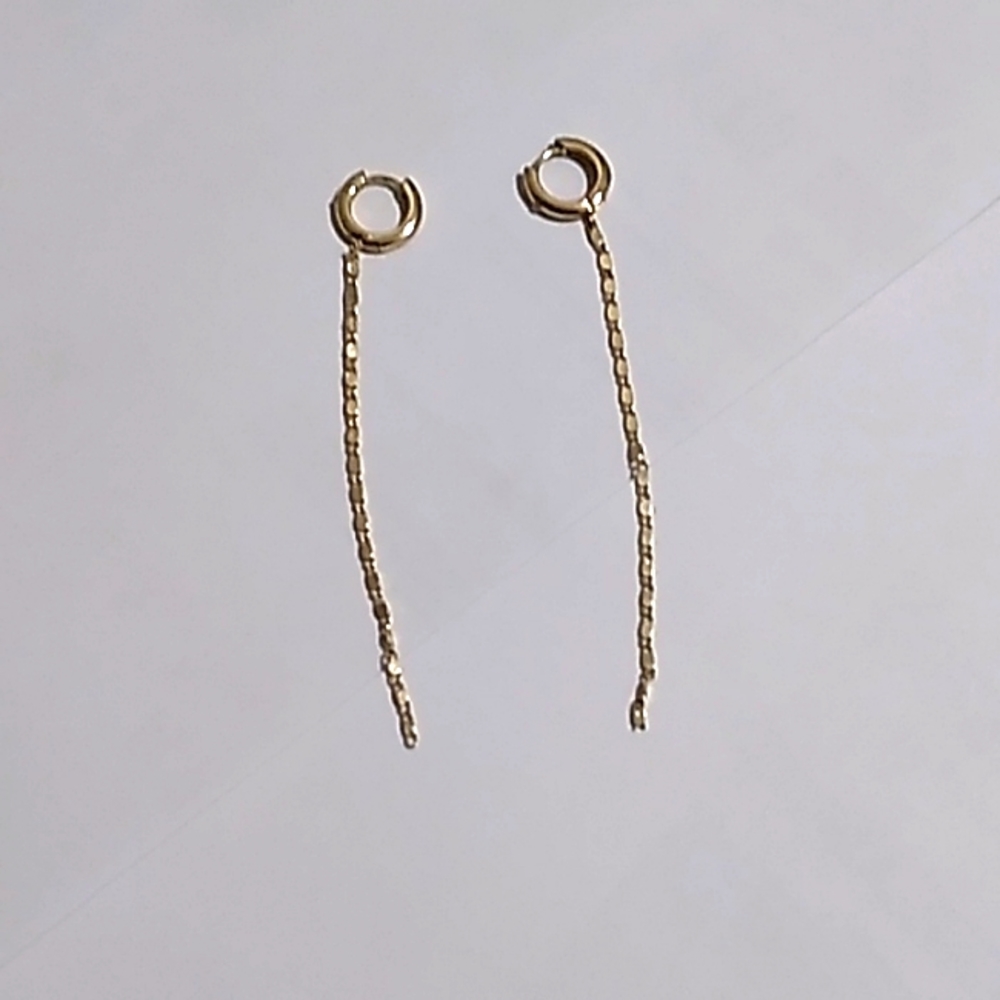 Gold colored earrings
